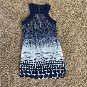 Navy and white patterned dress. Open back